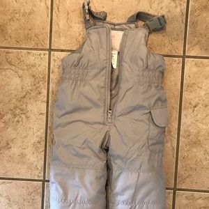 Toddler snowsuit with zip and buckle closure